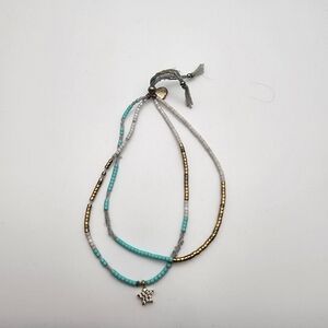 Estella Bartlett Teal, White, & Gold Tone Seed Bead & Rhinestone Star Bracelet